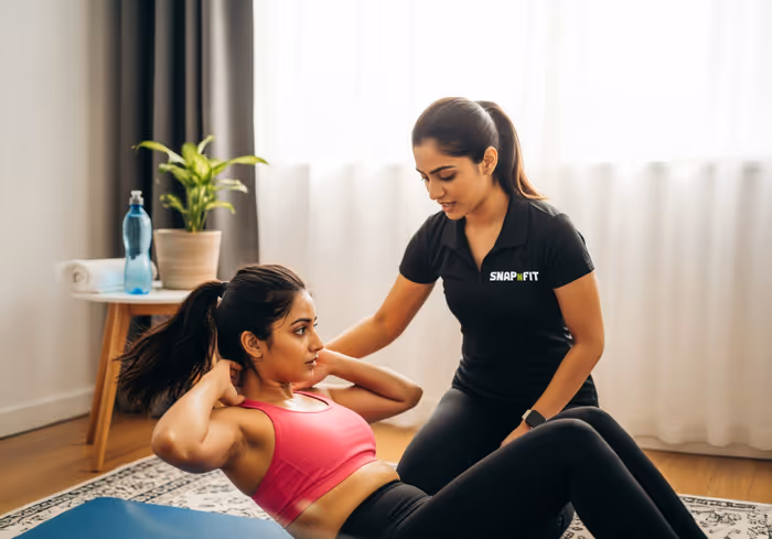 Trainer guiding client